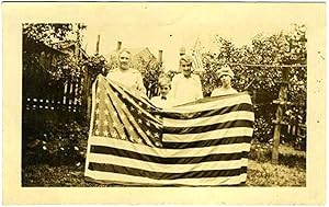 Family Holding Flag