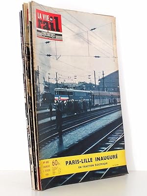 Seller image for La Vie du Rail [ lot de 7 numros avec des articles relatifs au rail vers ou  Lille ] : n 683 Paris-Lille inaugure en traction lectrique (fvrier 1959) ; n 693 Lille, "cette cit qui vaut une province" (avril 1959) ; n 959 lectrification Lille Hazebrouck (juin 1964) ; n 1426 futur mtro de Lille le VAL ? (Janvier 1974) ;n 1845 Lille, un bout d'essai pour le VAL (mai 1982) ; n 1880 Un Mongy rajeuni (Fvrier 1983) ; n 1948 Lille et sa rgion (juin 1984) for sale by Librairie du Cardinal