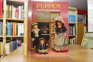 Puppen und Puppenhäuser.