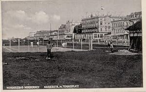 Image du vendeur pour Nordseebad Norderney. Kaiserstr. mit Tennisplatz. Ansichtskarte in Lichtdruck. Abgestempelt Norderney 02.07.1932. mis en vente par Antiquariat Heinz Tessin