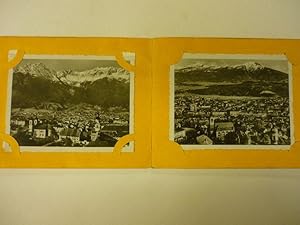12 s.w. Photos in gelber Phototasche eingesteckt