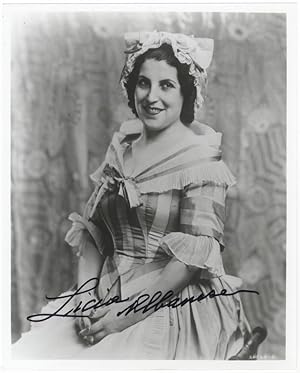 Role portrait photograph of the soprano in Mozart's The Marriage of Figaro. Signed in full