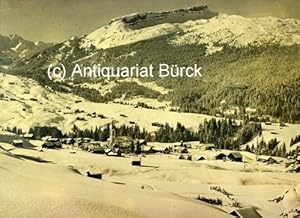 Winterliche Foto-Aufnahme von Riezlern im Kleinwalsertal mit dem Hohen Ifen und dem Gottesackerpl...