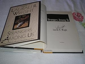 Bild des Verkufers fr Strangers Among Us: Signed zum Verkauf von SkylarkerBooks