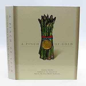 Imagen del vendedor de A Pinch of Gold: Winning Recipes Inspired by the Athletes of the Special Olympics North Carolina (First Edition) a la venta por Shelley and Son Books (IOBA)