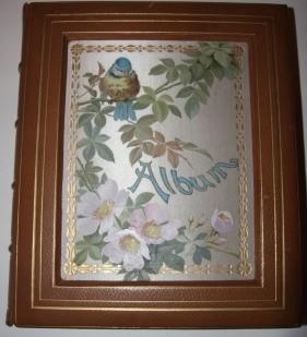 Photo Album with Sunken Inset Silk Panels with Chromolithographic Images of a Bluebird and Wild R...