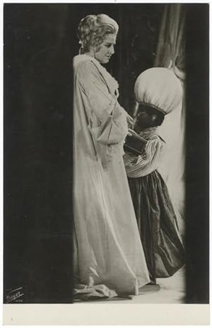 Full-length role portrait photograph of the soprano as the Marschallin with a young blackamoor in...