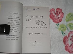 Seller image for Crossing The Lion: A Reigning Cats & Dogs Mystery: Signed for sale by SkylarkerBooks