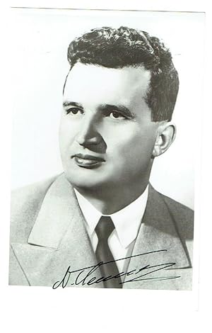 Glossy 5.5 x 8.25 portrait of Ceausescu, signed below in black ink, "N. Ceausescu."