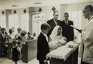 Photograph of the baptism of Douglas Harriman Kennedy. with Averell Harrimann as Godfather signed...