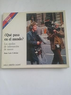 Imagen del vendedor de Que pasa en el mundo? a la venta por Libros Ambig