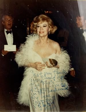 Color photograph of Glynis Johns receiving a Tony award in 1974 for A LITTLE NIGHT MUSIC, with Hu...