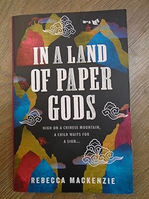 Seller image for IN A LAND OF PAPER GODS for sale by Happyfish Books