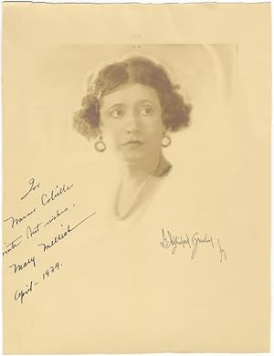Large head-and-shoulders photograph signed in full, dated April 1934, and inscribed to Warner Col...