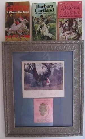 Framed photograph with Barbara Cartland's autograph, oak leaf from tree planted by Elizabeth I
