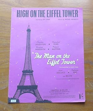 High on the Eiffel Tower.