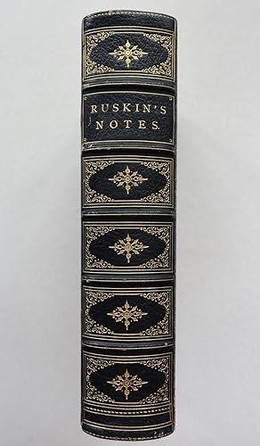 Imagen del vendedor de Ruskin's Notes [spine title], consisting of 11 works, including: (1) John Ruskin: A Bibliographical Biography [with:] (2) Notes on Drawings by Mr. Ruskin, Placed on Exhibition by Professor Norton in the Gallery of Messrs. Noyes & Blakeslee [with:] (3) My First Editor: An Autobiographical Reminiscence [with:] (4, 5) Guide to the Principal Pictures in the Academy of Fine Arts at Venice, [Part I], II [with:] (6) Catalogue of the Sketches and Drawings by J.M.W. Turner, R.A. Exhibited in Marlborough House in the Year 1857-8 [with:] (7) The Relation Between Michael Angelo and Tintorent, Seventh of the Course of Lectures on Sculpture Delivered at Oxford, 1870-71, and 4 others a la venta por George Ong Books