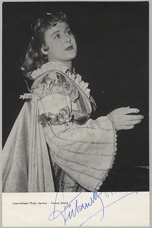 Waist-length role portrait photograph in costume in an unknown role, signed in full