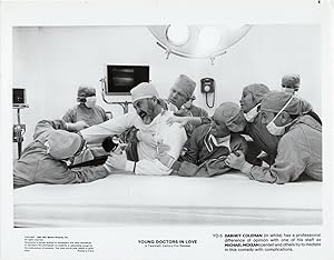 Imagen del vendedor de Young Doctors in Love (Two original photographs from the 1982 film) a la venta por Royal Books, Inc., ABAA