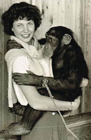 Vintage Photograph of Young Woman Holding a Chimpanzee