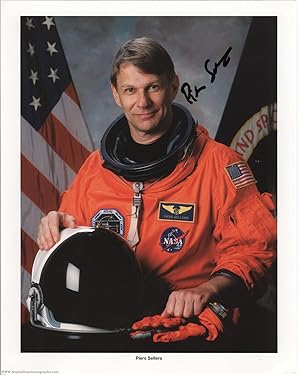 Coloured NASA photo signed (Piers John, born 1955, British American Meteorolgist and NASA Astronaut)