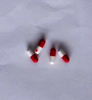 Bild des Verkufers fr Pill Clock (4 red & white pills) ephemera by Carsten Holler zum Verkauf von DR Fine Arts