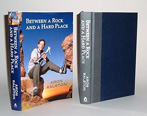 Imagen del vendedor de Between a Rock and A Hard Place a la venta por Azarat Books