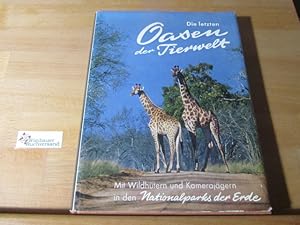 Seller image for Die letzten Oasen der Tierwelt : Mit Wildhtern u. Kamerajgern in d. Nationalparks d. Erde. Mit e. Einl. von Heinz Heck u. Beitr. von . Zsstellung u. Bearb.: u. Bernd Lohse. Bilderl.: K. L. Koch-Isenburg. 114 ein- u. mehrfarb. Bildseiten mit Fotos von W. Schack [u.a.] for sale by Antiquariat im Kaiserviertel | Wimbauer Buchversand