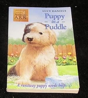 Bild des Verk�ufers f�r Puppy in a Puddle zum Verkauf von Yare Books