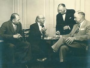 Imagen del vendedor de Photographic print of three men [including Arthur Meier Schlesinger Sr.?] seated, one man standing. a la venta por Wittenborn Art Books