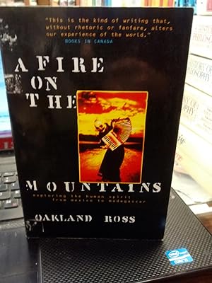 Seller image for A FIRE ON THE MOUNTAINS Exploring the Human Spirit from Mexico to Madagascar (signed copy) for sale by Paraphernalia Books 'N' Stuff