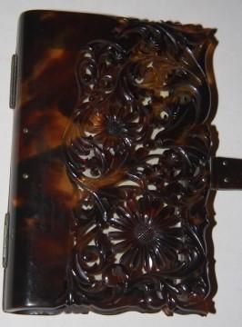 Tortoiseshell-Bound Notebook with floral fretwork on the front and back, a one leaf writing surfa...