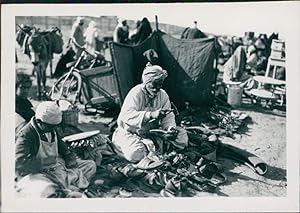 Egypt, Ismailia, Cobbler repairing the shoes
