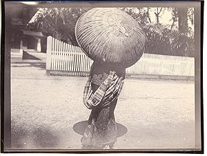 Indonesia, Borneo, A little girl with a large straw hat