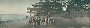 Japan, Panoramic View. Group of Europeans on the beach