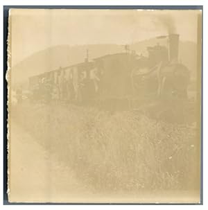 Passagers dans un train d'époque