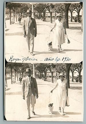 France, Royan sur Océan, Couple se promenant avec leur chien