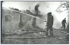 Firemen in operation