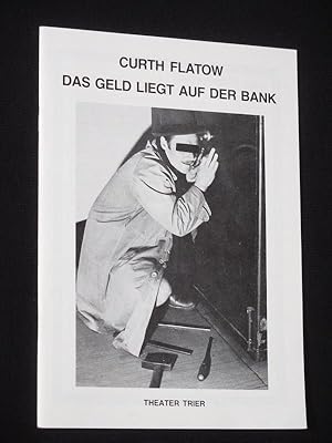 Bild des Verkufers fr Programmheft 10 Theater der Stadt Trier 1986/87. DAS GELD LIEGT AUF DER BANK von Flatow. Insz.: Werner Baer, Bhne/ Kostme: Manuela Wagner. Mit Gerhard Erfurt, Elisabeth Pagitz, Erik Raskopf, Hubert Pfisterer, Barbara Flei, Michael Lang, Axel Axt, Manfred-Paul Hnig, David Steck, Heinz Kamen, Heribert Schmitt zum Verkauf von Fast alles Theater! Antiquariat fr die darstellenden Knste