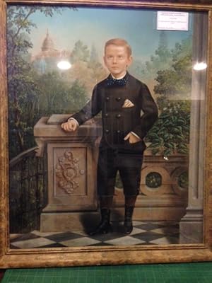 PORTRAIT OF BOY WITH THE U.S. CAPITOL BUILDING IN BACKGROUND. [title supplied]