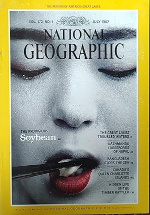 Imagen del vendedor de National Geographic Magazine, July, 1987 / "The Prodigious Soybean;" "The Great Lakes' Troubled Waters;" "Kathmandu, Crossroads of Nepal;" "Bangladesh Stops the Sea;" "Canada's Queen Charlotte Islands;" "Hidden Life of the Timber Rattler" a la venta por Shore Books