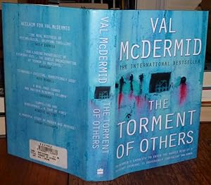 Immagine del venditore per The Torment of Others. Harper Collins, 2004, First. Edition, with DW. SIGNED COPY. Very Good+ venduto da Ely Books