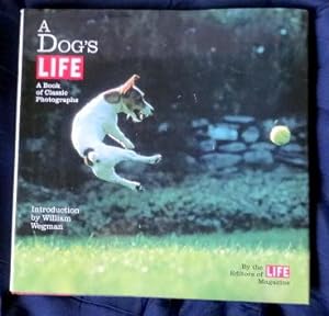 Imagen del vendedor de A Dog's Life: A Book of Classic Photographs. a la venta por The Bookstall