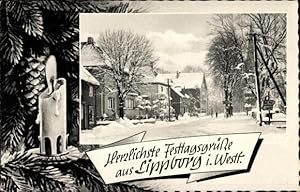 Bild des Verkufers fr Passepartout Ansichtskarte / Postkarte Lippborg Lippetal Nordrhein Westfalen, verschneite Strae, Weihnachtskerze zum Verkauf von akpool GmbH