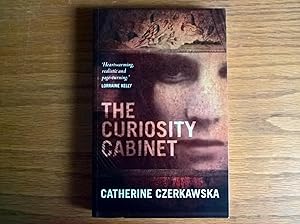 The Curiosity Cabinet - signed, lined and dated first edition pbo