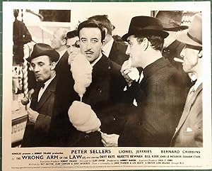 Seller image for The Wrong Arm of the Law' Original Lobby Card; Peter Sellers & Bernard Cribbins eating candy floss at the fair. for sale by Rattlesnake Books