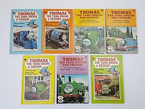 Image du vendeur pour Seven Ladybird editions of Thomas The Tank Engine And Friends, comprising: Thomas and Terence and James and the Tar Wagons; Thomas Goes Fishing and James & The Troublesome Trucks; Percy and Harold and Percy Takes The Plunge; Thomas & Trevor and Duck Takes Charge; Percy Runs Away and Thomas & The Breakdown Train; Pop Goes The Diesel, Dirty Work and A Close Shave; Thomas and Bertie and Thomas Down The Mine mis en vente par Keoghs Books