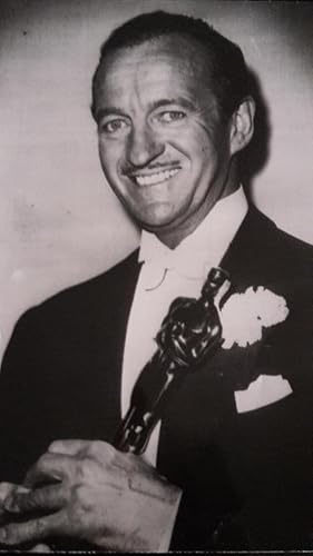 The English Actor David Niven receiving the Oscar