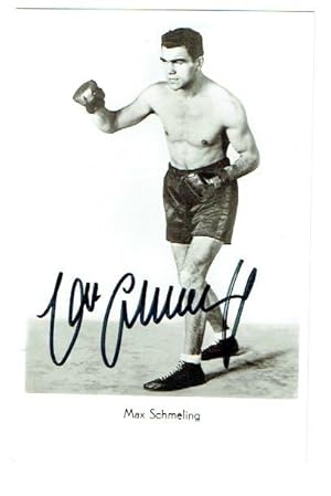 Signed 3.5 x 5.5 photograph of Schmeling standing in full length boxing action pose.