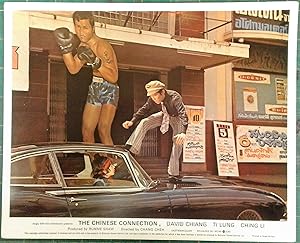 Imagen del vendedor de The Chinese Connection, rare Hong Kong martial arts film, original Lobby Card. David Chiang atop a car a la venta por Rattlesnake Books